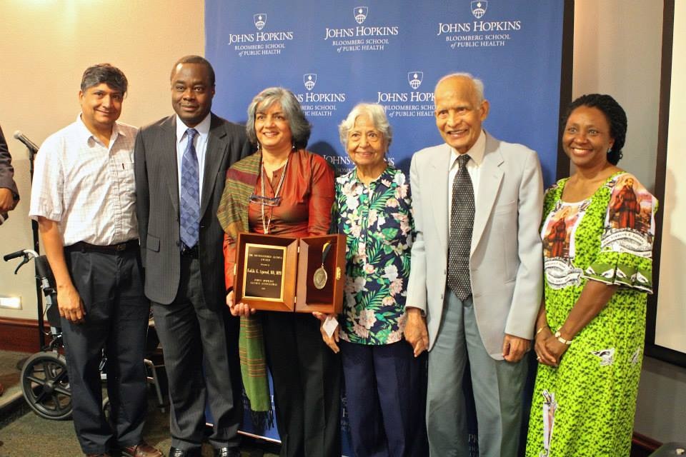 Koki with her award in a group photo